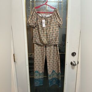 Girls size 14, 2 piece outfit. Brand new new with tags.